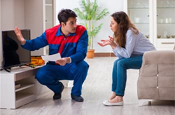Repairman-repairing-tv-at-home---350X230-